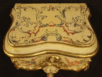 Antique Venetian low table in lacquered, gilded and painted wood of the 20th century