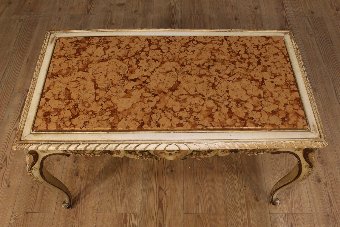 Antique Italian coffee table in lacquered, gilded and painted wood of the 20th century