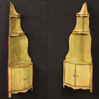 Pair of Italian corner shelves in lacquered wood