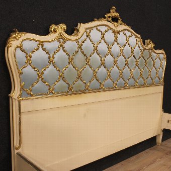 Antique Italian double bed in lacquered, gilded and painted wood