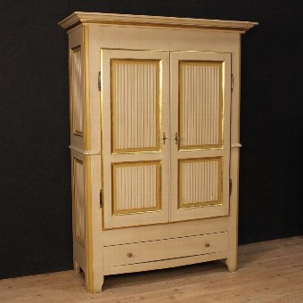 Italian wardrobe in lacquered and gilded wood