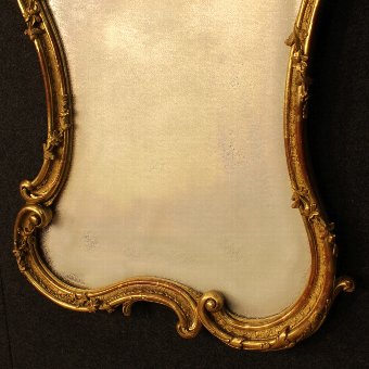 Antique French gilded mirror in wood and plaster of the late 19th century