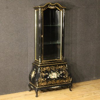 Spanish lacquered and painted showcase with floral decorations