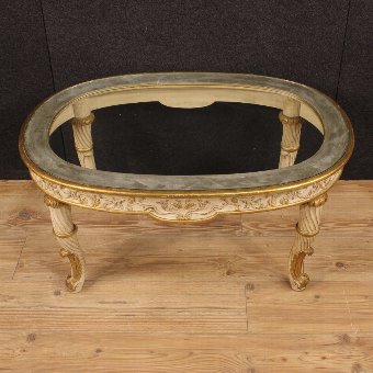 Antique Italian coffee table in lacquered and gilded wood with glass top