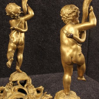 Antique Antique pair of French candle holder in gilded bronze of the 19th century