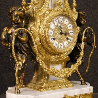 Antique Triptych clock with candlesticks in marble and bronze