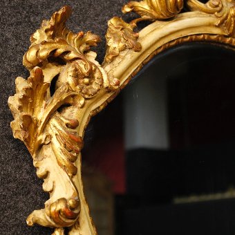 Antique Italian lacquered and gilt mirror