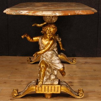 Antique Italian coffee table with marble top and little angels sculptures