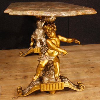 Antique Italian coffee table with marble top and little angels sculptures