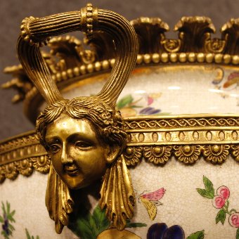 Antique Ceramic cup with golden bronze decorations