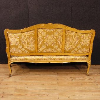 Antique Antique golden sofa in Louis XV style of the 19th century