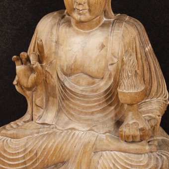 Antique Oriental Buddha sculpture in wood