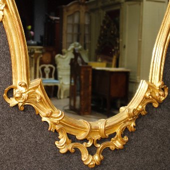 Antique Venetian mirror in golden wood