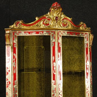 Antique Florentine lacquered and golden corner cupboard