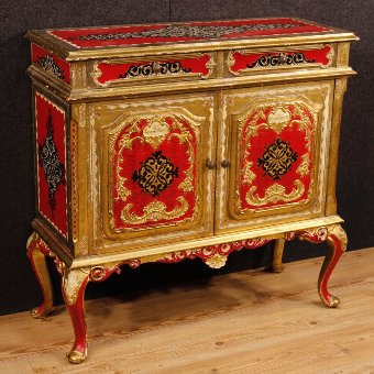 Florentine lacquered, golden and silvered sideboard