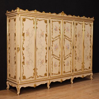 Italian wardrobe in lacquered, gilded and painted wood with 6 doors