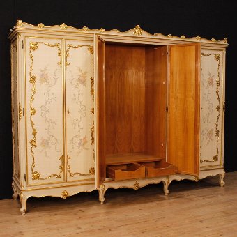 Antique Italian wardrobe in lacquered, gilded and painted wood with 6 doors