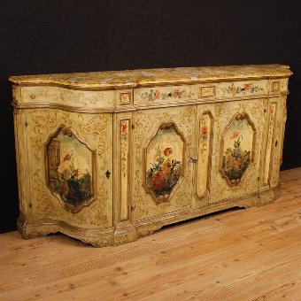 Venetian lacquered and painted sideboard with floral decorations
