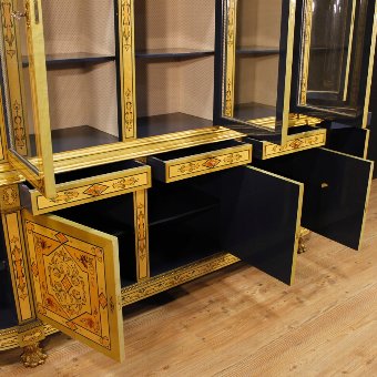 Antique French bookcase in inlaid wood with golden bronzes
