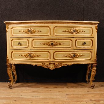Antique Italian chest of drawers in lacquered and gilded wood