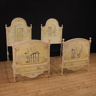 Pair of Italian beds in lacquered and painted iron