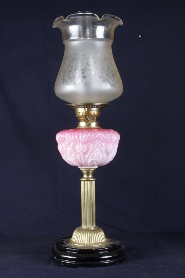 a collectible oil lamp ..Lovely and Huge Pink Ruby Red Antique Victorian Banquet Oil Lamp with a lovely etched shade