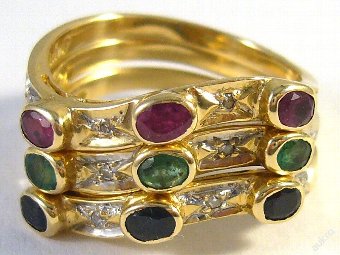 Stackable 14 kt gold ring with diamonds and gems