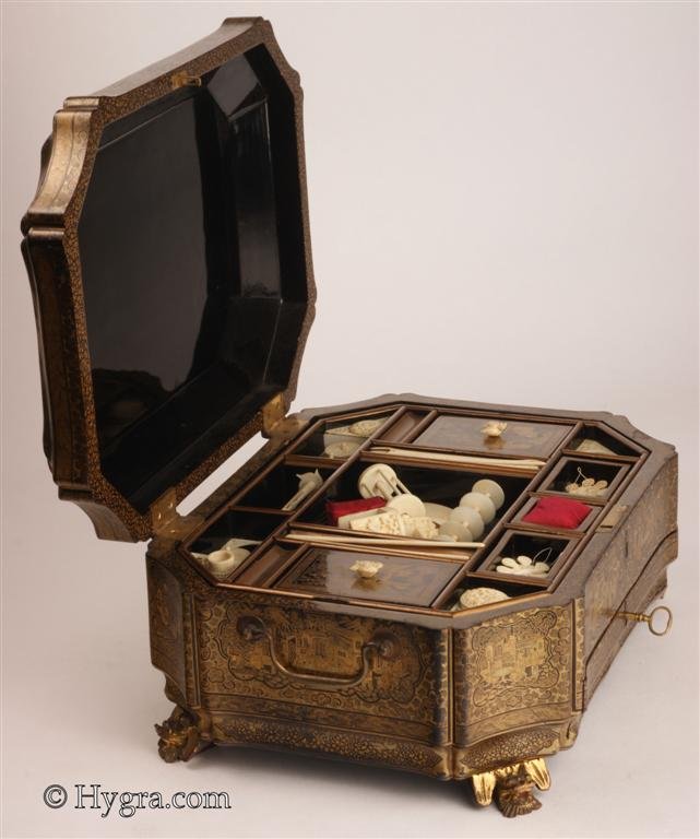 Antique Chinese Export Lacquer fully fitted sewing box with gold decoration depicting scenes of Chinese life Circa 1835