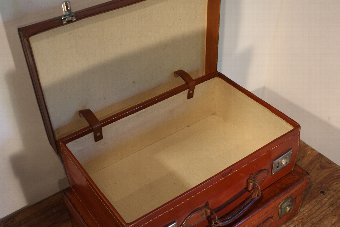 Antique Two matched vintage leather suitcases - Harrods of London