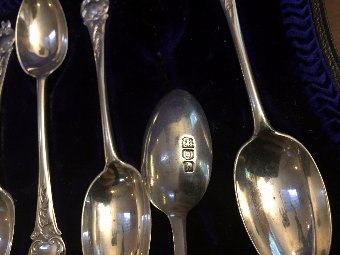 Antique Antique set of 12 sterling silver teaspoons and sugar tongs circa 1905