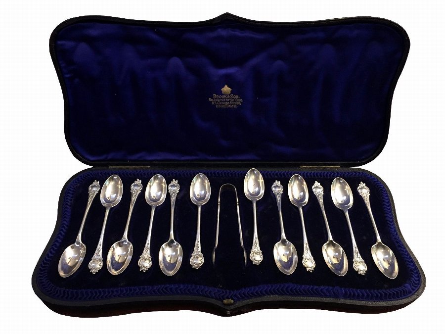 Antique Antique set of 12 sterling silver teaspoons and sugar tongs circa 1905