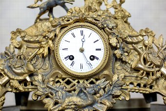 Antique Mantel Clock with a Glass Dome