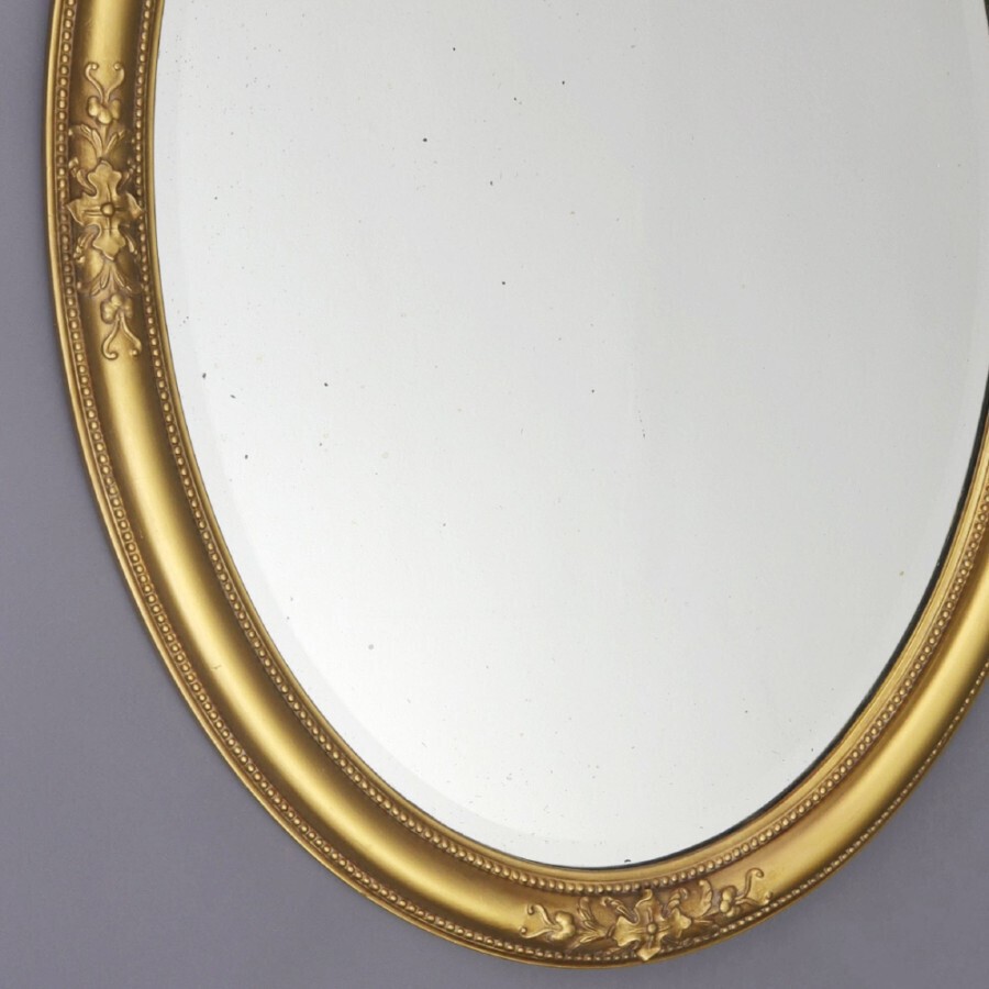Late 19th Century Gilt Oval Bevelled Mirror with Acanthus Decoration c1880