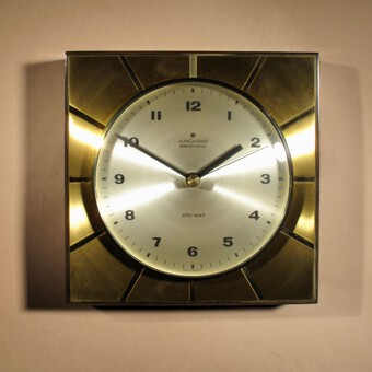 A stylish Design Junghans Ato-Mat Wall Clock.