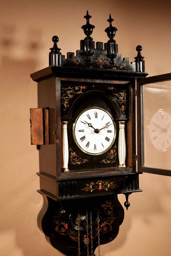 Antique A Very Decorative and Original Black Forest Wall Clock.