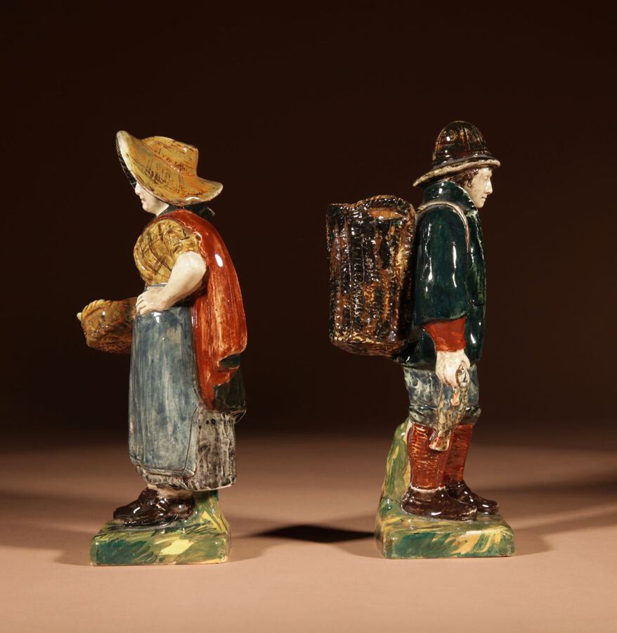 Antique A rare pair of Dutch ROZENBURG figures, showing a fisherman and woman. marked for: ROZENBURG, 1894