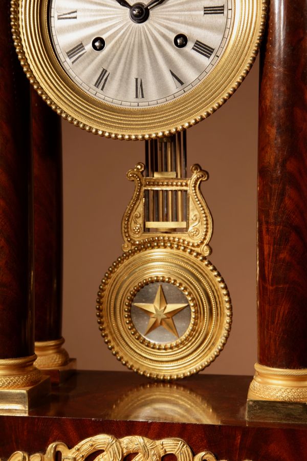 Antique A Finely Made Louis Philippe Mahogany and Ormolu Portico Clock Circa: 1830-1837
