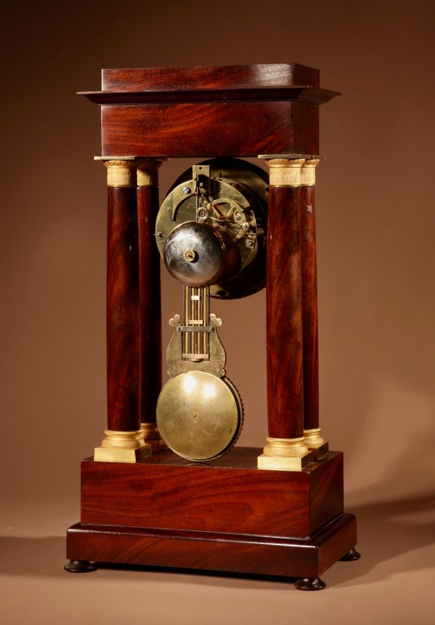 Antique A Finely Made Louis Philippe Mahogany and Ormolu Portico Clock Circa: 1830-1837
