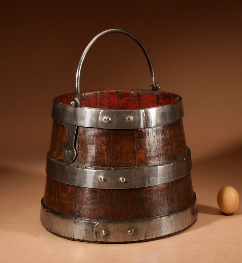 An Oak And Wrought Iron Bound Coopered Ships Bucket.