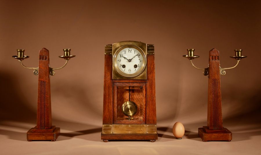 Art Nouveau/Deco Gustav Serrurier-Bovy (1858-1910) A Rare Oak And Brass Clock Garniture, Circa 19...