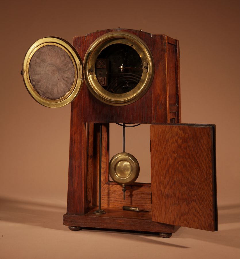 Antique Art Nouveau/Deco Gustav Serrurier-Bovy (1858-1910) A Rare Oak And Brass Clock Garniture, Circa 1900-10.