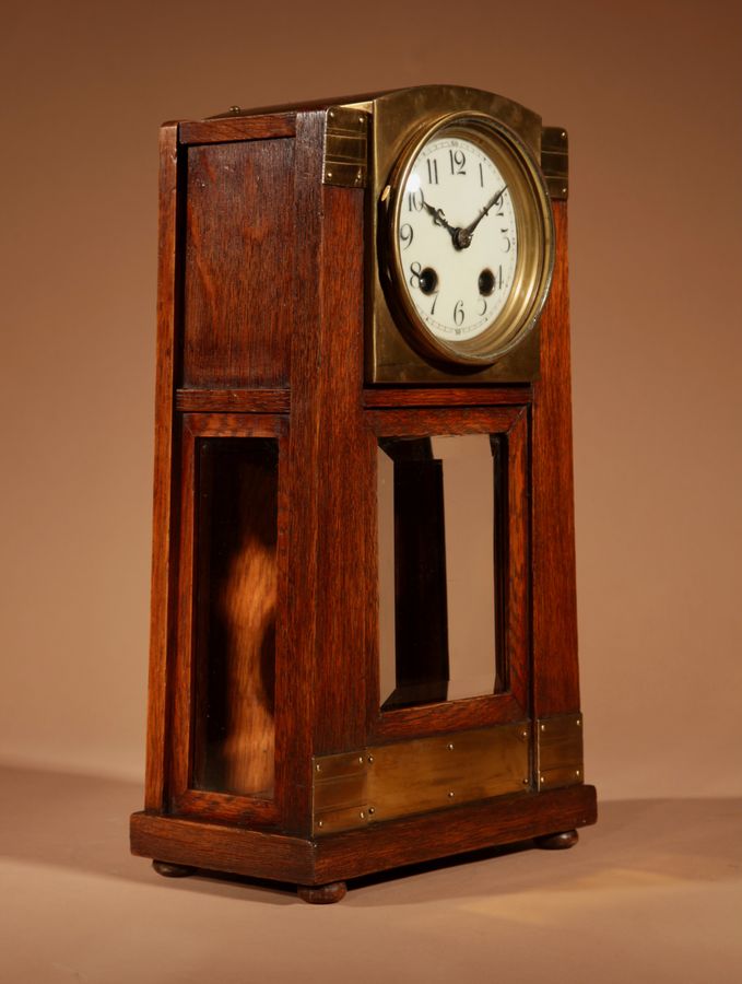 Antique Art Nouveau/Deco Gustav Serrurier-Bovy (1858-1910) A Rare Oak And Brass Clock Garniture, Circa 1900-10.