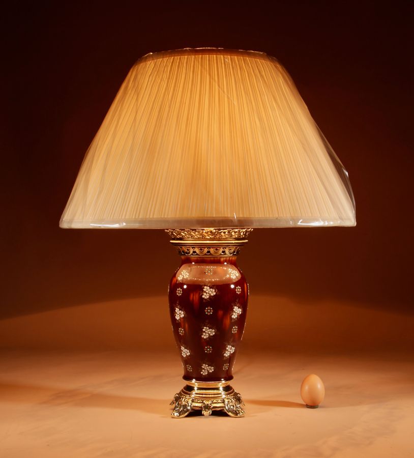 Antique A French Ceramic And Brass Table Lamp.