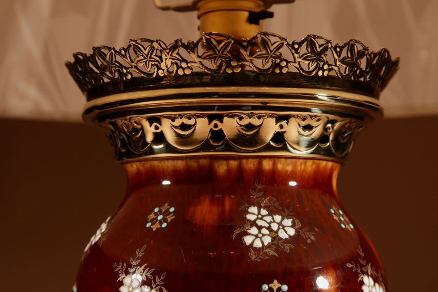 Antique A French Ceramic And Brass Table Lamp.