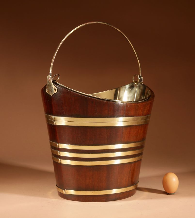 A Fine Quality Mahogany Brass Bound Boat (Schuitje) Shaped Peat Bucket Tea Stove Jardinière.