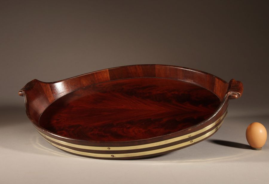 A Very Decorative and Useful Original Oval Mahogany And Brass Coopered Tray.