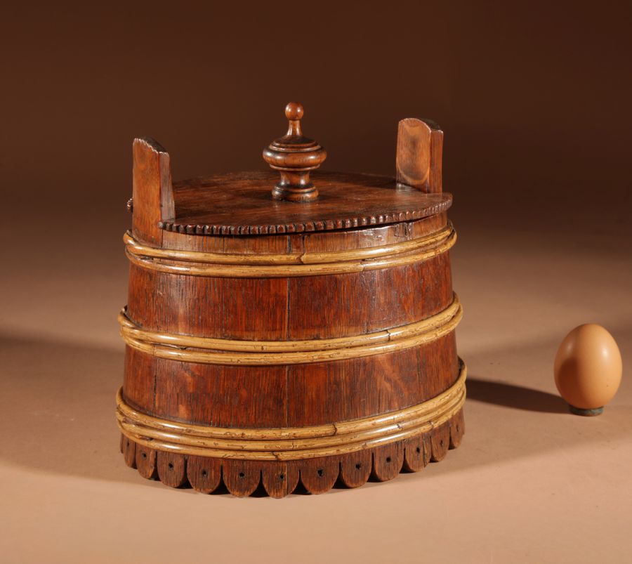 A Decorative Oval Oak Butter Tub.