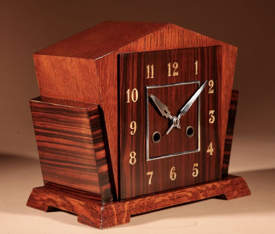 Antique A Very Stylish Typical Art Deco Amsterdam School Oak and Macassar Ebony/Coromandel Mantel Clock.