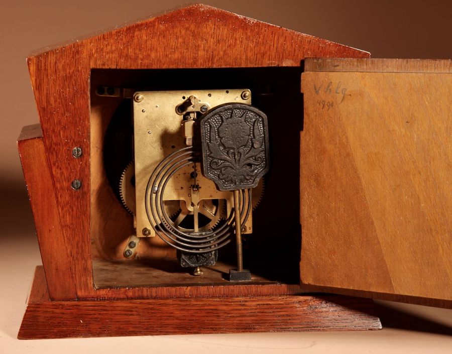 Antique A Very Stylish Typical Art Deco Amsterdam School Oak and Macassar Ebony/Coromandel Mantel Clock.