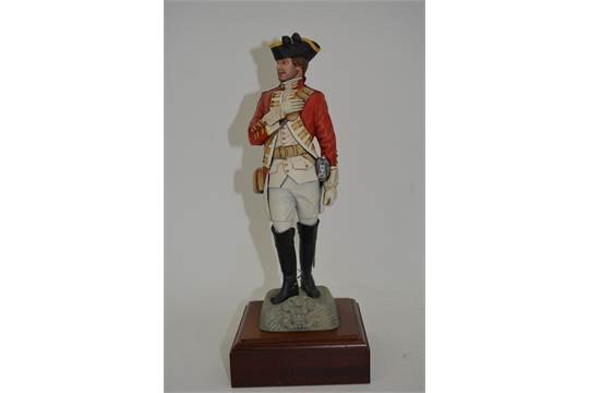 finely detailed model depicting an officer of the British Cavalry atop a rock
